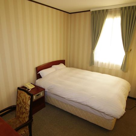 Tsukubanoyu Urban Hotel Zimmer foto